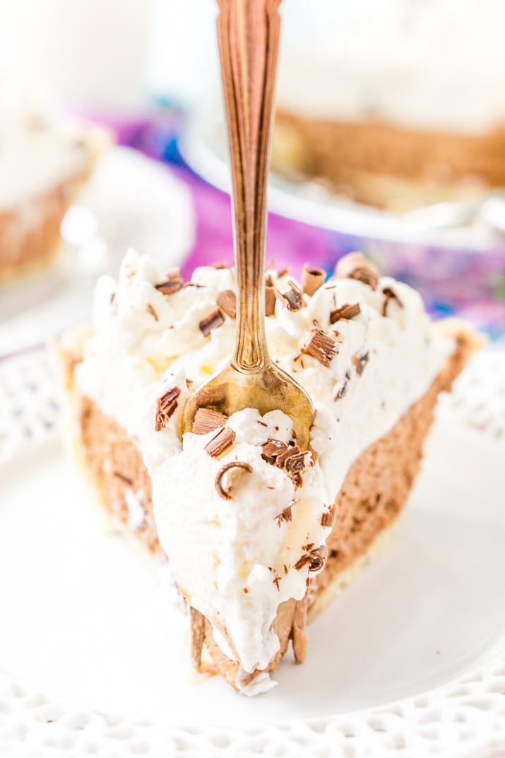 Fork cutting into a slice of French Silk Pie