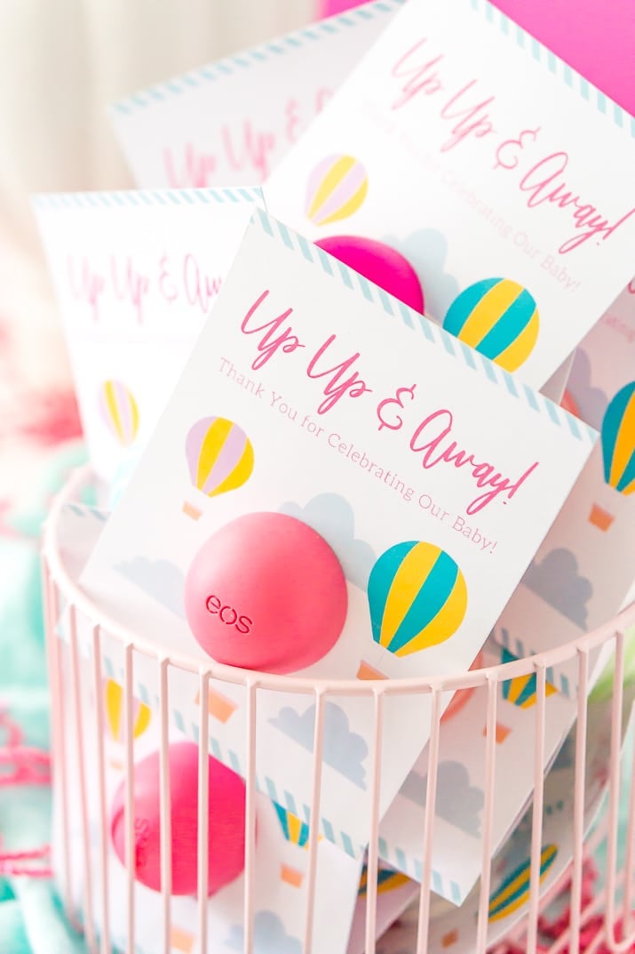 These Baby Shower Favors are a Free Printable perfect for any travel themed baby shower. These Party Favors were designed to fit EOS lip balms.