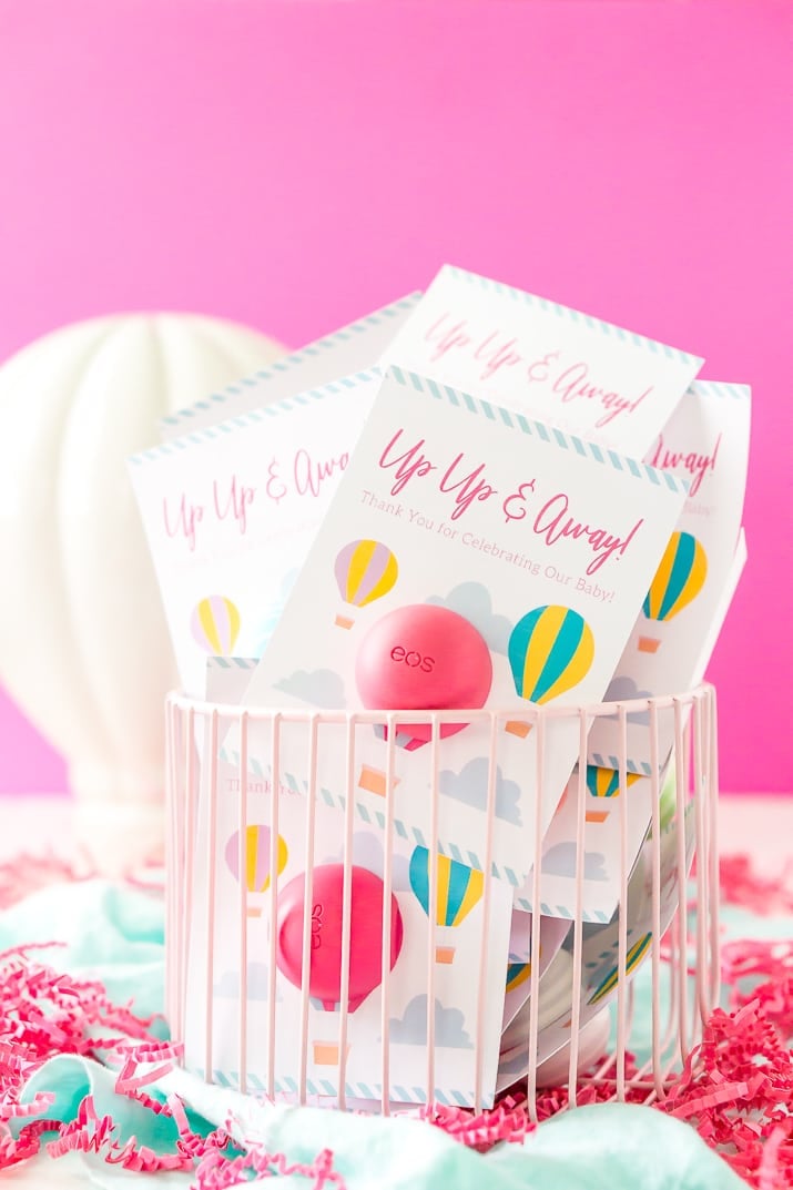 These Baby Shower Favors are a Free Printable perfect for any travel themed baby shower. These Party Favors were designed to fit EOS lip balms.
