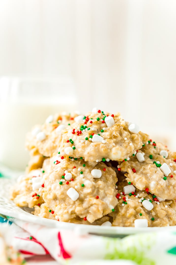 These White Hot Chocolate No Bake Cookies are so simple to make with butter, oatmeal, marshmallows, pudding, hot chocolate mix and more! They're nut and gluten free and Santa is sure to gobble them up!