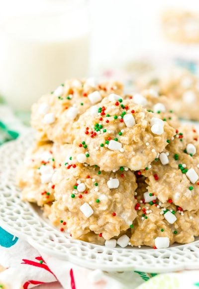 These White Hot Chocolate No Bake Cookies are so simple to make with butter, oatmeal, marshmallows, pudding, hot chocolate mix and more! They're nut and gluten free and Santa is sure to gobble them up!