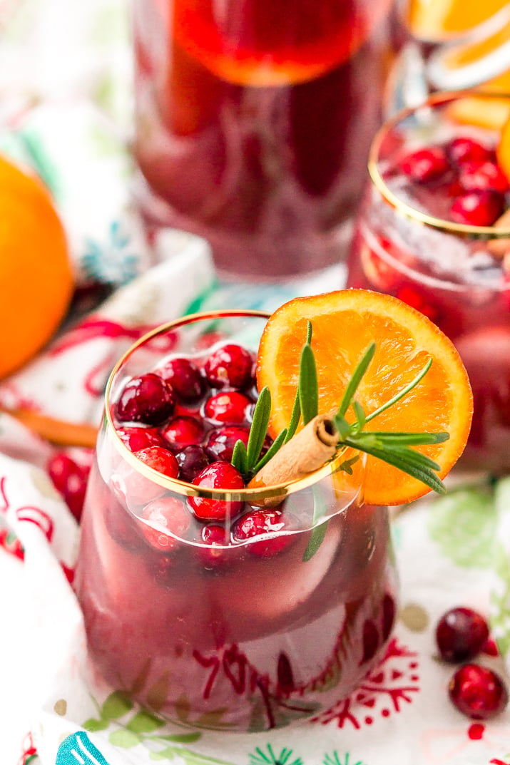 This Christmas Sangria is made with red wine, fruit juices, brandy, soda, and fruit for a delicious big-batch cocktail that's perfect for parties.