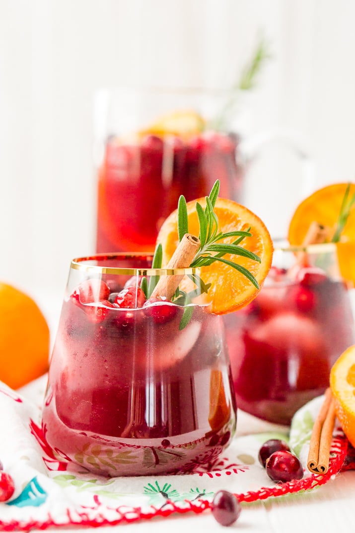 This Christmas Sangria is made with red wine, fruit juices, brandy, soda, and fruit for a delicious big-batch cocktail that's perfect for parties.