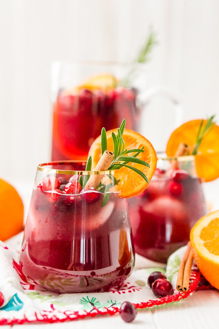 This Christmas Sangria is made with red wine, fruit juices, brandy, soda, and fruit for a delicious big-batch cocktail that's perfect for parties.