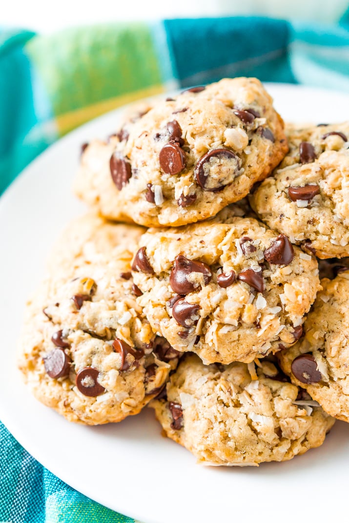 Oatmeal Chocolate Chip Lactation Cookies on a white plate with blue napkin.