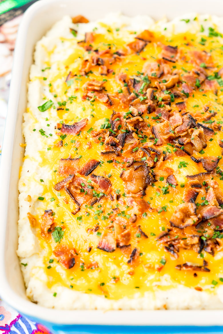 Loaded Cauliflower Casserole is an easy and delicious low carb and keto-friendly side dish loaded with bacon, cheddar cheese, sour cream, garlic, and more!