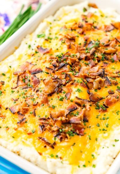 Loaded Cauliflower Casserole is an easy and delicious low carb and keto-friendly side dish loaded with bacon, cheddar cheese, sour cream, garlic, and more!