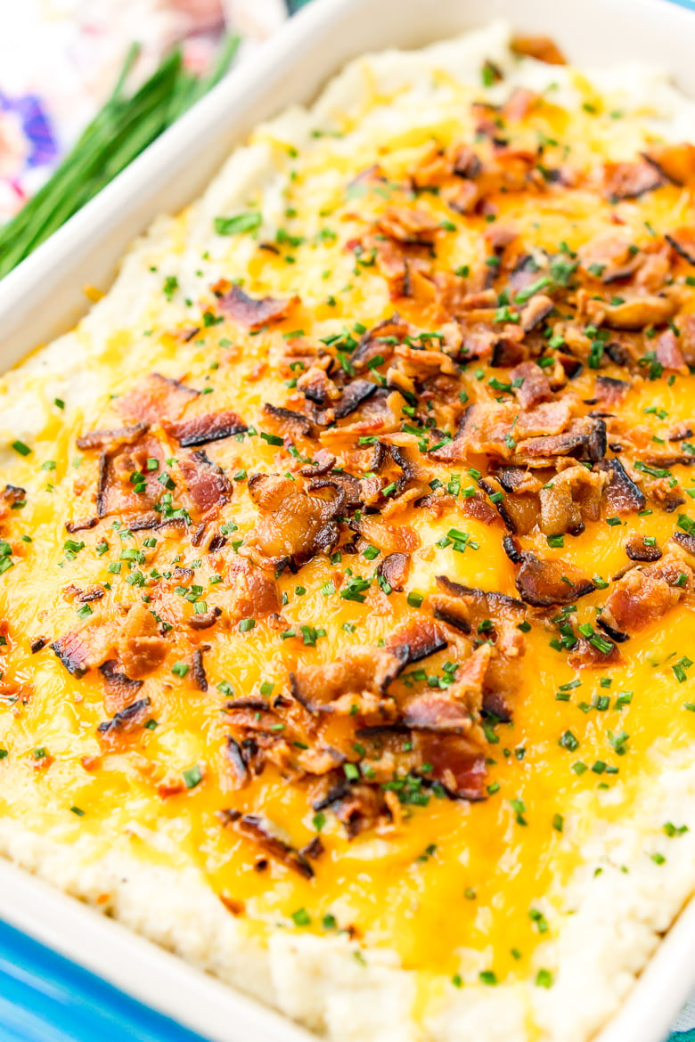 Loaded Cauliflower Casserole is an easy and delicious low carb and keto-friendly side dish loaded with bacon, cheddar cheese, sour cream, garlic, and more!