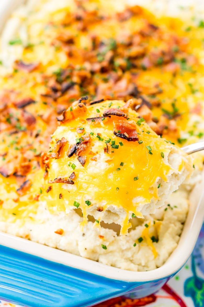 Loaded Cauliflower Casserole is an easy and delicious low carb and keto-friendly side dish loaded with bacon, cheddar cheese, sour cream, garlic, and more!