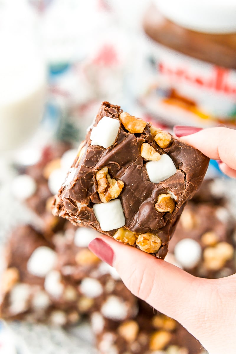 Nutella Rocky Road Fudge is perfect for Nutella and fudge lovers, alike! Loaded with marshmallows, walnuts, and chocolate chips, it’s an easy and delicious treat that everyone will love.