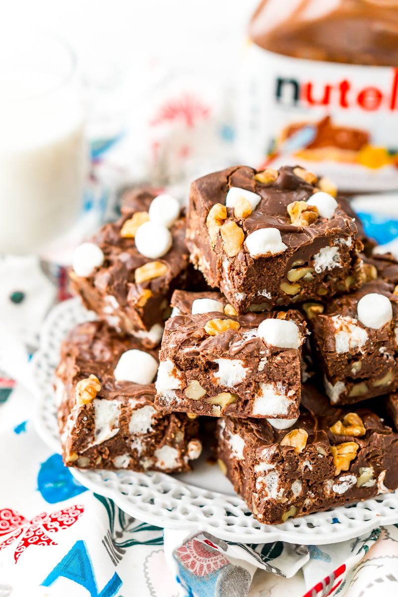 Nutella Rocky Road Fudge on white plate with tub of Nutella.