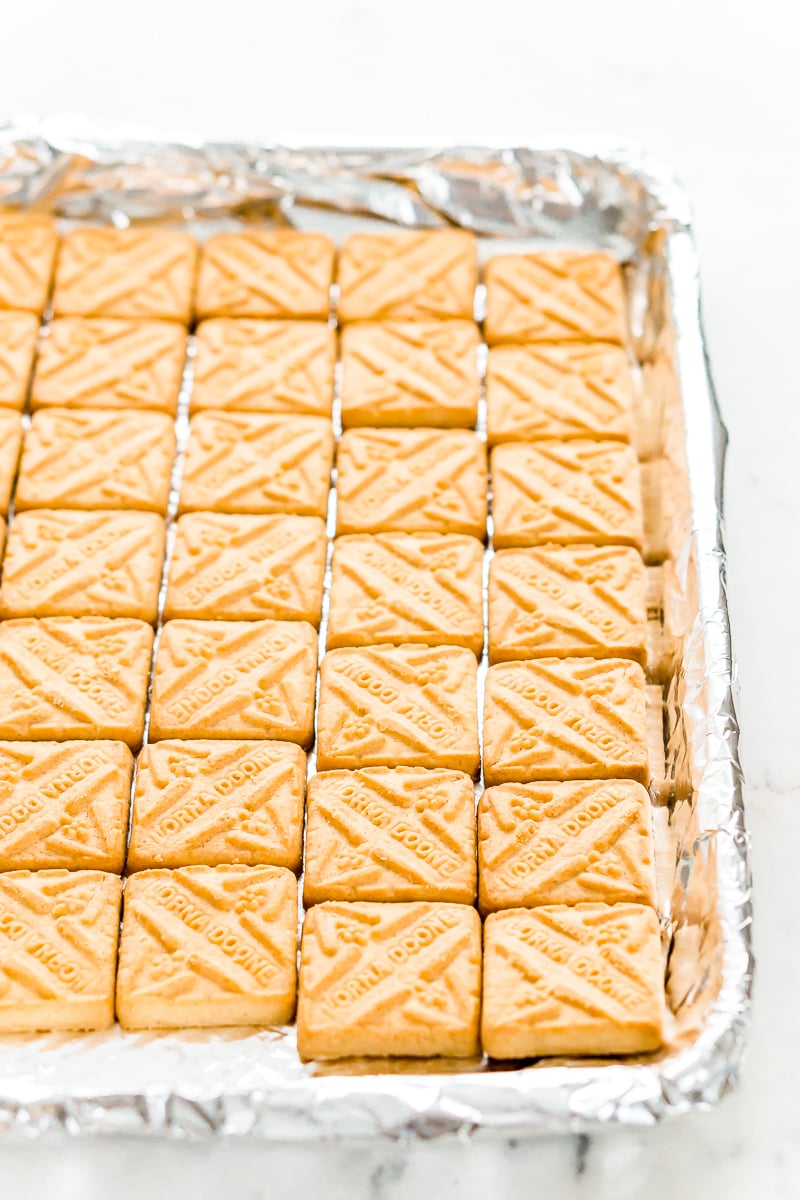 Shortbread cookies on a foil lined pan.