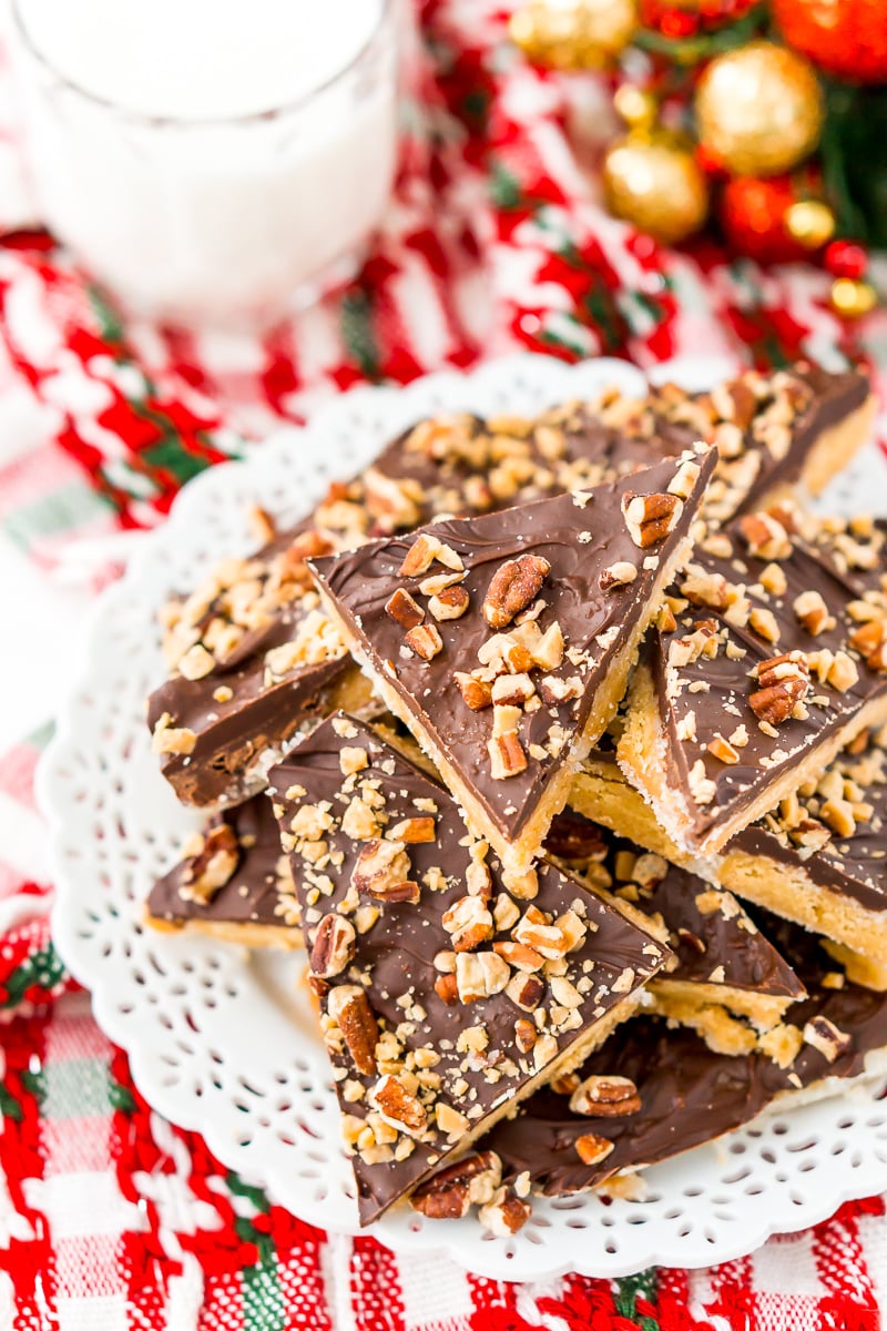 This Shortbread Christmas Crack is insanely easy to make and even more delicious! Made with shortbread cookies, butter, sugar, chocolate, pecans, and toffee bits.