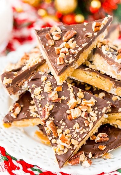 This Shortbread Christmas Crack is insanely easy to make and even more delicious! Made with shortbread cookies, butter, sugar, chocolate, pecans, and toffee bits.