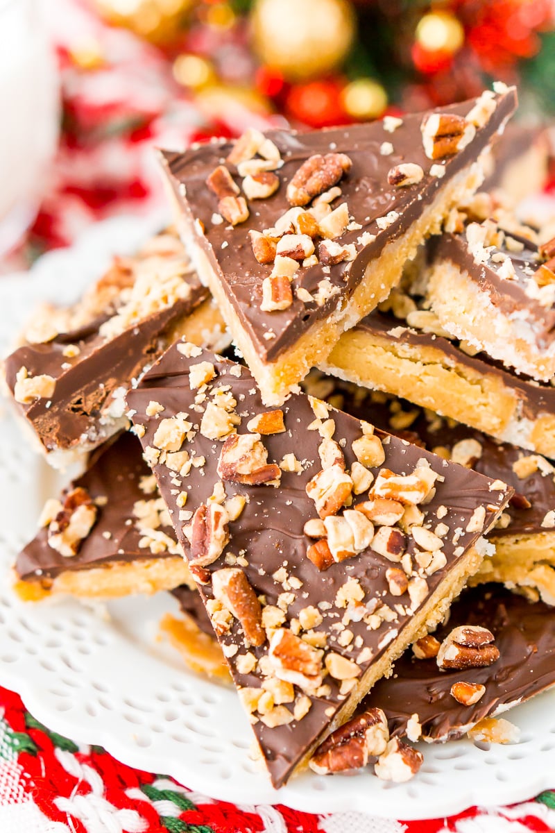 This Shortbread Christmas Crack is insanely easy to make and even more delicious! Made with shortbread cookies, butter, sugar, chocolate, pecans, and toffee bits.