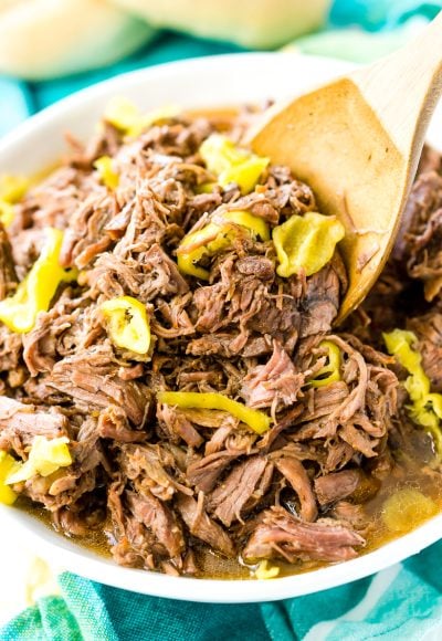 This Slow Cooker Italian Beef is an easy dinner recipe inspired by the Chicago staple that has so much flavor it will literally melt in your mouth!