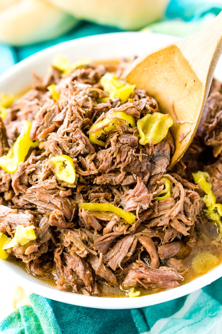 This Slow Cooker Italian Beef is an easy dinner recipe inspired by the Chicago staple that has so much flavor it will literally melt in your mouth!