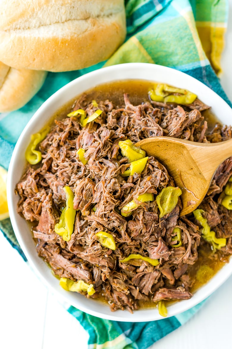 This Slow Cooker Italian Beef is an easy dinner recipe inspired by the Chicago staple that has so much flavor it will literally melt in your mouth!