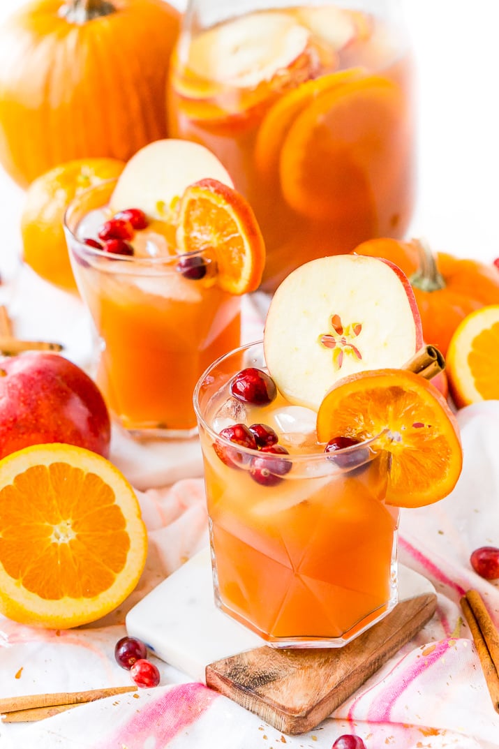 This Thanksgiving Punch made with apple cider, whiskey, fruit juice, brandy, and soda packs the delicious flavors of fall and winter in one delicious holiday drink recipe!