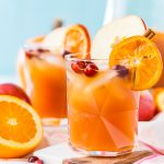 This Thanksgiving Punch made with apple cider, whiskey, fruit juice, brandy, and soda packs the delicious flavors of fall and winter in one delicious holiday drink recipe!