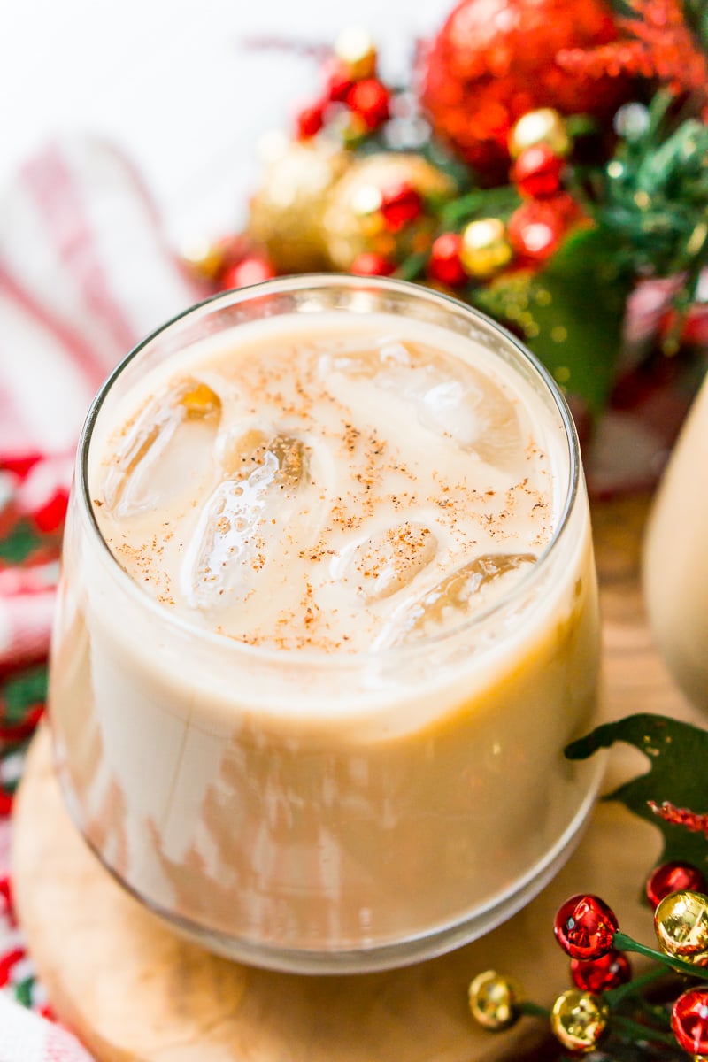 This Eggnog White Russian is a fun holiday twist on the classic vodka cocktail! Made with eggnog, coffee liqueur, vodka, and a dash of nutmeg!