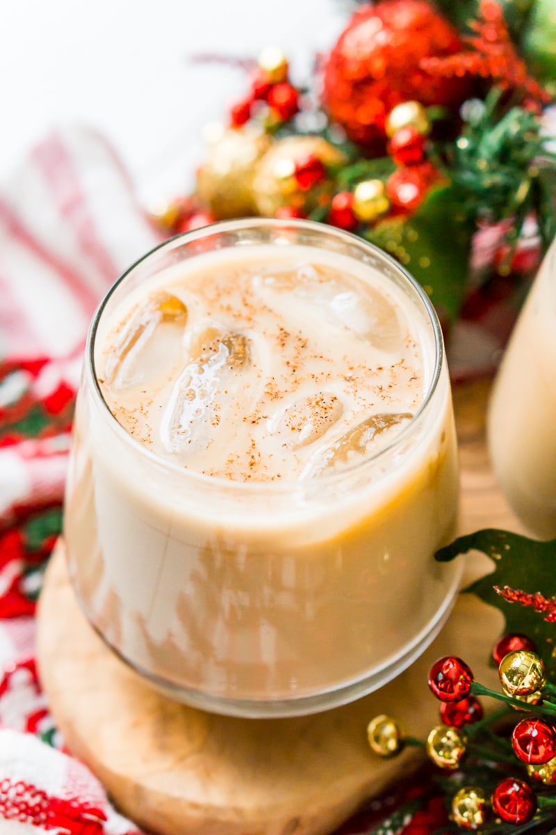 This Eggnog White Russian is a fun holiday twist on the classic vodka cocktail! Made with eggnog, coffee liqueur, vodka, and a dash of nutmeg!