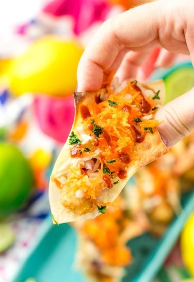 These Fish Sticks Wonton Tacos are an easy appetizer recipe perfect for get-togethers. Each mini taco is made with Crunchy Breaded Fish Sticks, crunchy slaw, and an Asian-inspired sauce.
