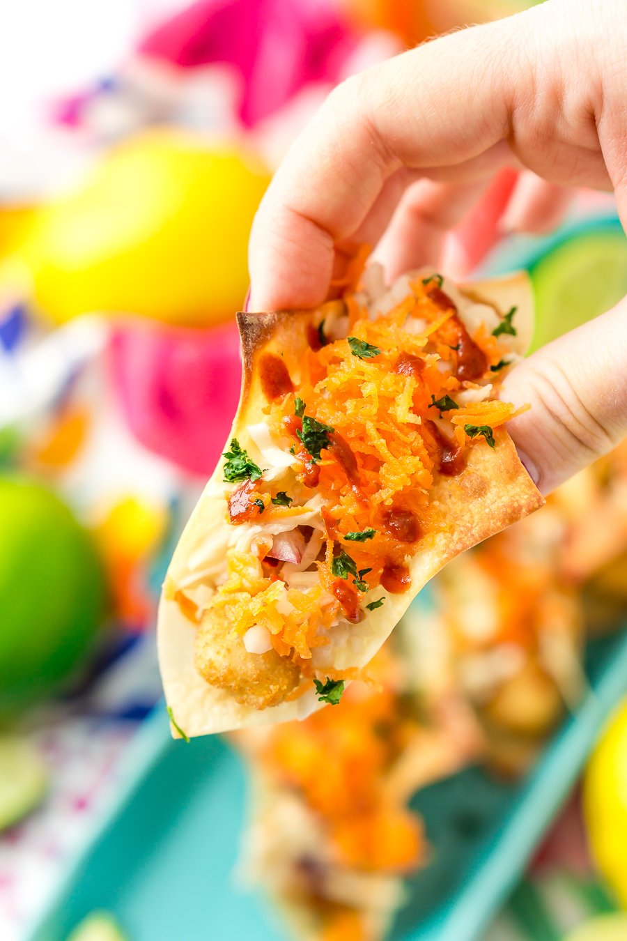 These Fish Sticks Wonton Tacos are an easy appetizer recipe perfect for get-togethers. Each mini taco is made with Crunchy Breaded Fish Sticks, crunchy slaw, and an Asian-inspired sauce.