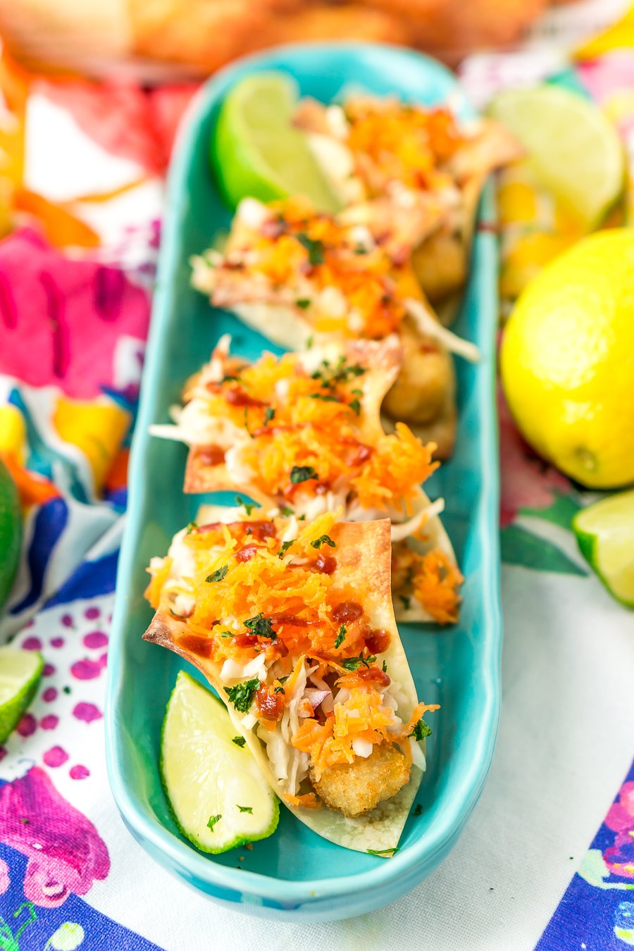 These Fish Sticks Wonton Tacos are an easy appetizer recipe perfect for get-togethers. Each mini taco is made with Crunchy Breaded Fish Sticks, crunchy slaw, and an Asian-inspired sauce.