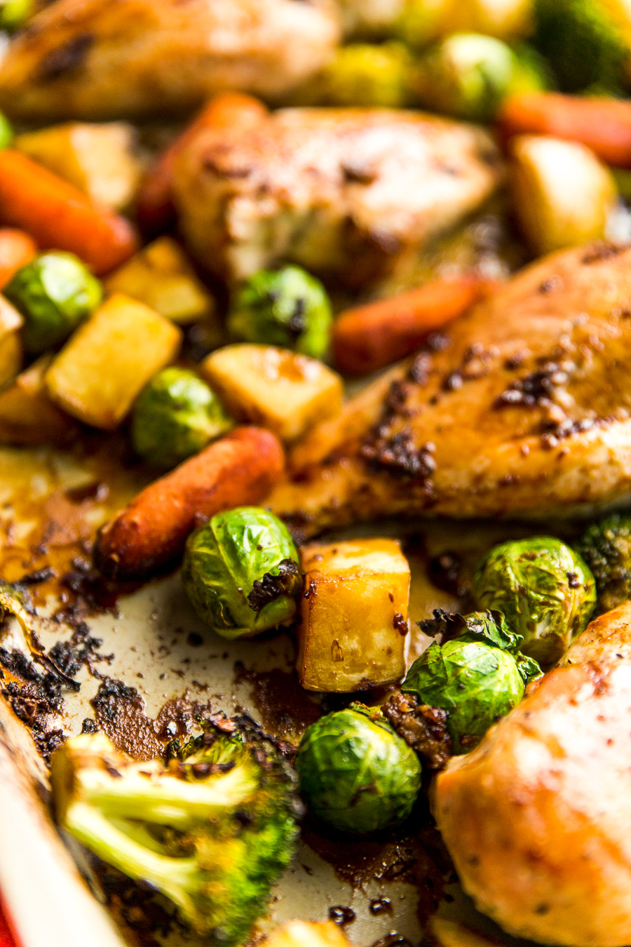 This Honey Ginger Chicken Sheet Pan Dinner is an easy Asian-inspired dish made with a tangy homemade sauce. You only need one pan to make it, so cleanup is a breeze!