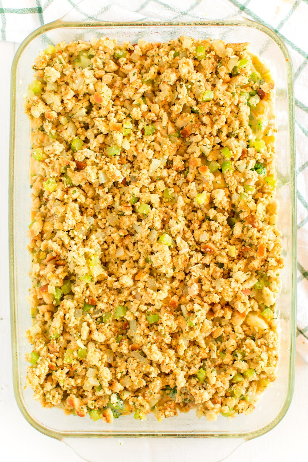 Overhead photo of a casserole dish with Broccoli Cheese Casserole.