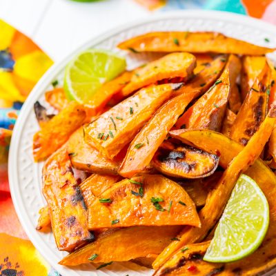 Chile Lime Sweet Potato Wedges are lighter than fries and potato skins, but just as delicious. With a squeeze of lime, a dash of garlic, and a kick of chile, this side is so flavorful, you won’t miss the extra calories!