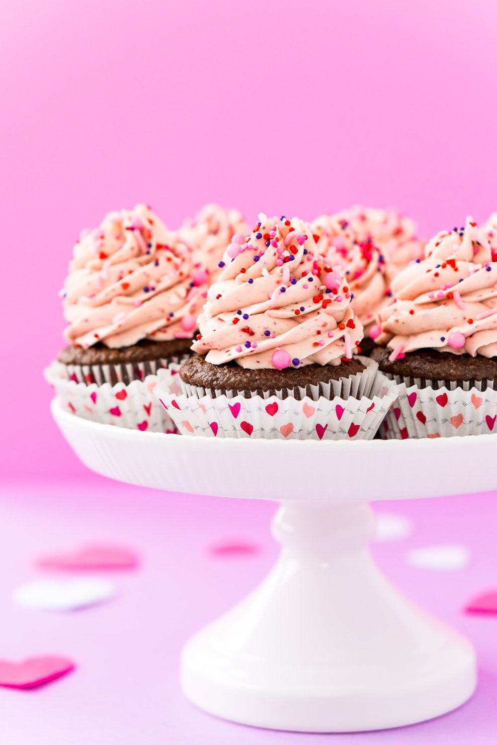 These Strawberry Chocolate Cupcakes are a delicious blend of rich chocolate cake and sweet strawberry whipped cream frosting! Perfect for Valentine's Day, Baby Showers, Bridal Showers, and more!