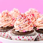 These Strawberry Chocolate Cupcakes are a delicious blend of rich chocolate cake and sweet strawberry whipped cream frosting! Perfect for Valentine's Day, Baby Showers, Bridal Showers, and more!