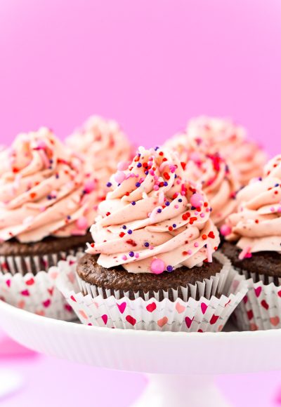 These Strawberry Chocolate Cupcakes are a delicious blend of rich chocolate cake and sweet strawberry whipped cream frosting! Perfect for Valentine's Day, Baby Showers, Bridal Showers, and more!