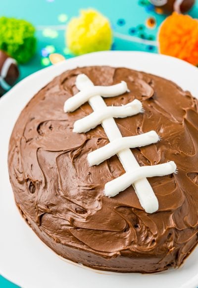 This Easy Football Cake is the perfect game day dessert! Use this simple step-by-step tutorial to make this recipe for your next football party!
