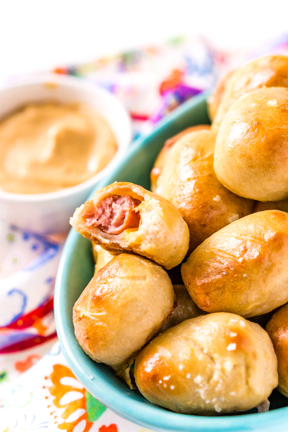 These Pretzel Pigs In A Blanket take two of your favorite party foods and combine them into one!