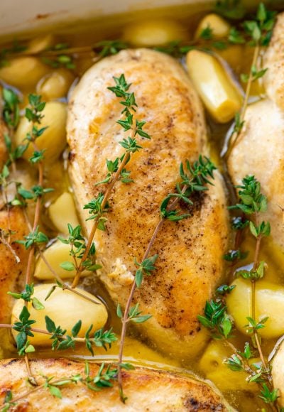 Garlic Chicken is a delicious dairy-free dinner recipe that's easy enough for weeknights and refined enough for special occasions. Made with chicken, garlic, olive oil, thyme, salt, and pepper.