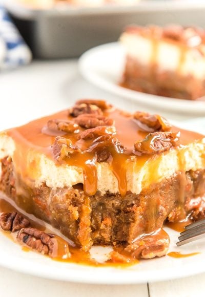 This Sea Salt Caramel Carrot Cake Poke Cake is so sweet and delicious, you'll never want any other carrot cake again! Baked to perfection and saturated in sweetened condensed milk, then topped with fluffy frosting and drenched in caramel sauce.