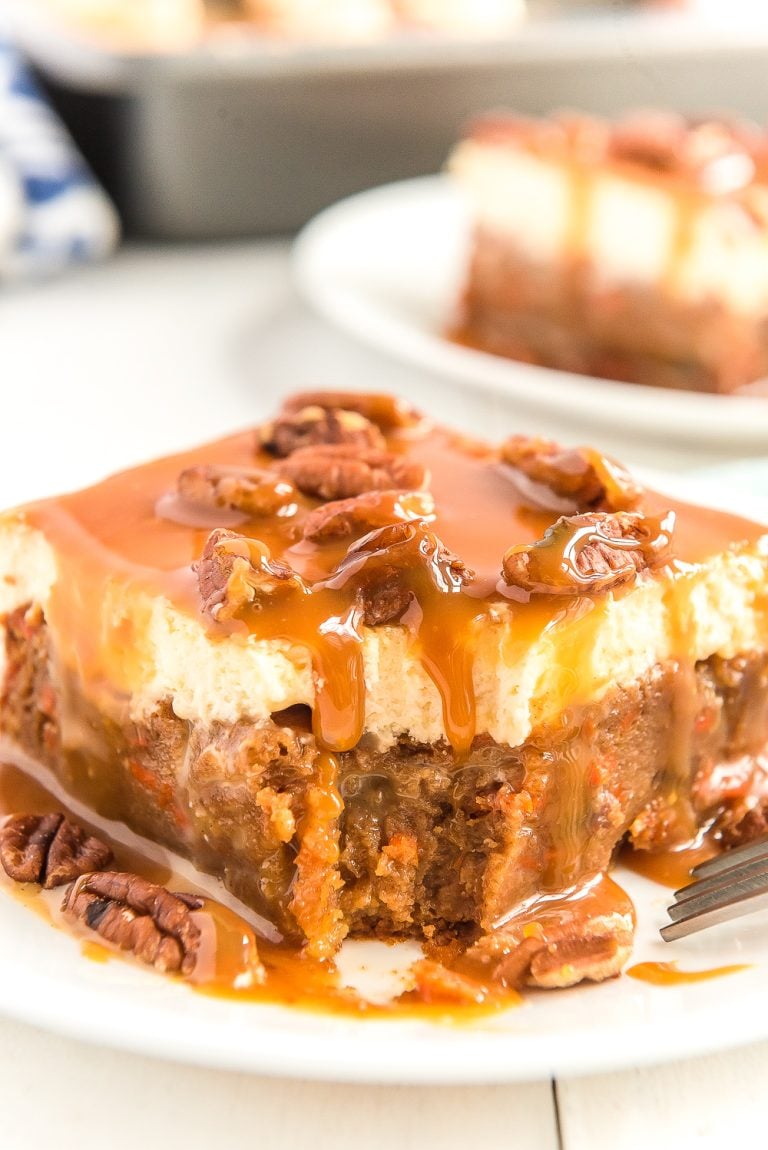 This Sea Salt Caramel Carrot Cake Poke Cake is so sweet and delicious, you'll never want any other carrot cake again! Baked to perfection and saturated in sweetened condensed milk, then topped with fluffy frosting and drenched in caramel sauce.