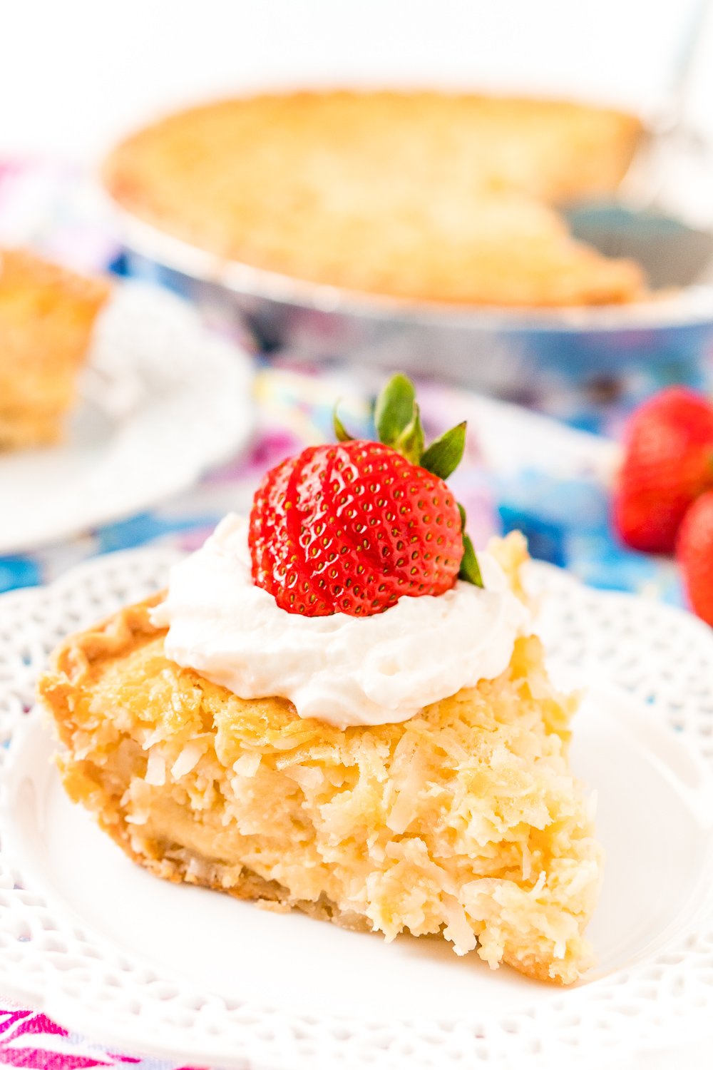 Coconut Custard Pie is a dense and creamy treat made with just 7 ingredients including coconut, milk, and eggs! It’s super simple to whip up for any gathering this spring, especially for Easter dessert!