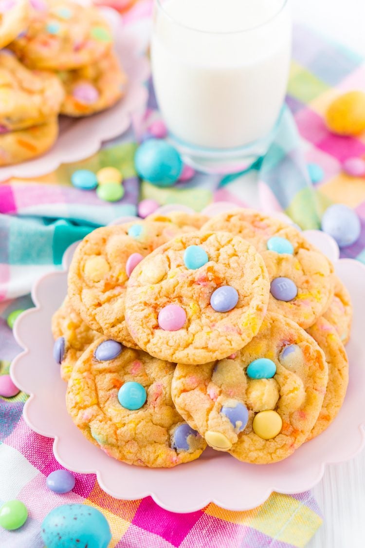 Cake mix cookies with M&Ms on a pink plate.