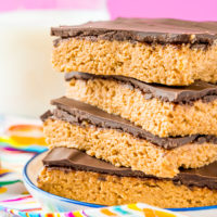 Peanut Butter Bars are a classic, 5-ingredient dessert recipe that can be made in less than 10 minutes! Made with a blend of peanut butter, graham crackers, powdered sugar, butter, and chocolate!