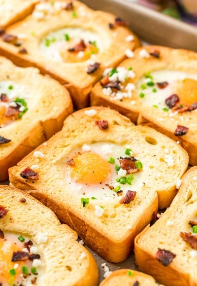 This Sheet Pan Egg In A Hole recipe is a simple way to prepare the traditional Egg-In-A-Hole breakfast dish for a crowd in less than 20 minutes!