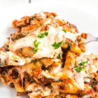 Turkey Florentine pasta bake served on a white plate.