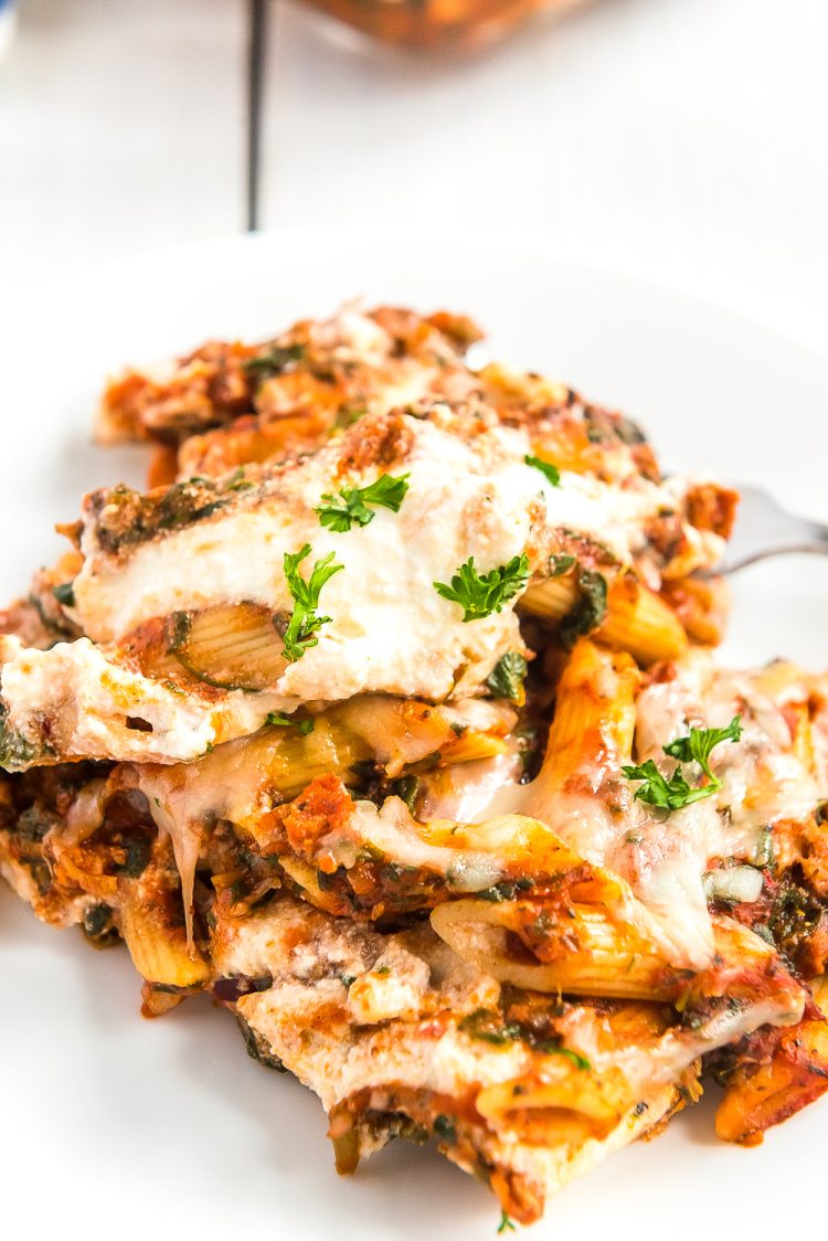 Turkey Florentine pasta bake served on a white plate.