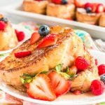 Berry Stuffed French Toast is a fruity, creamy, and indulgent breakfast recipe that combines macerated berries with a sweet mascarpone mixture and thick slices of French bread.