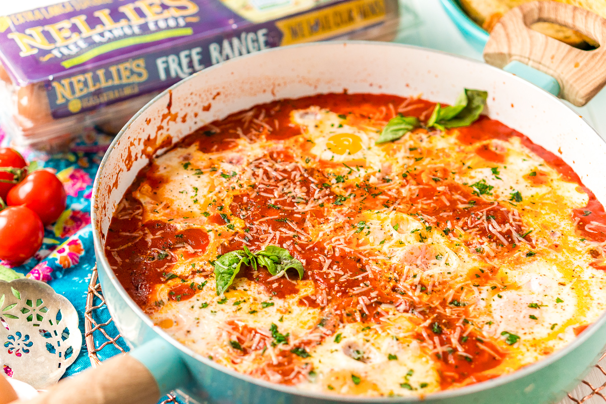 Eggs In purgatory in a blue skillet.