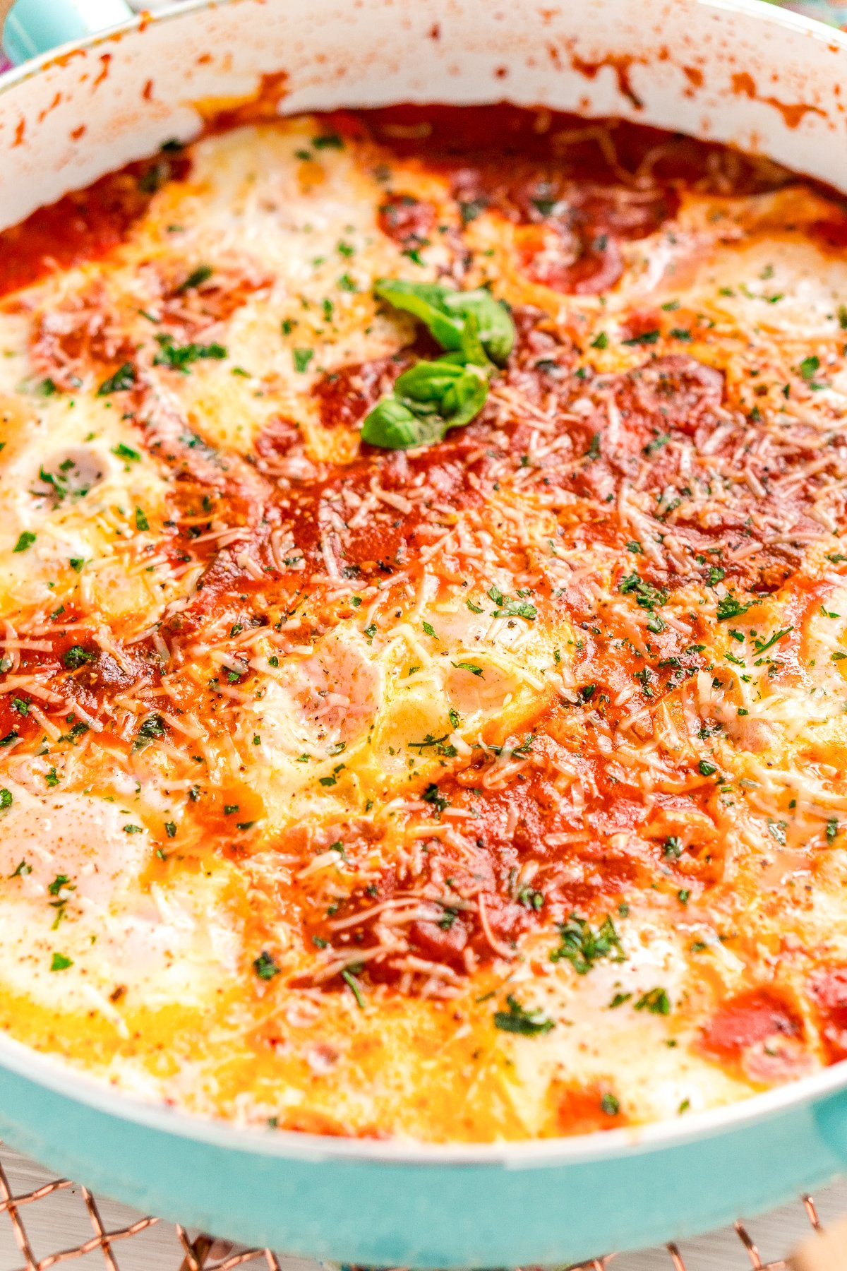 Close up photo of a skillet with Eggs In Purgatory.