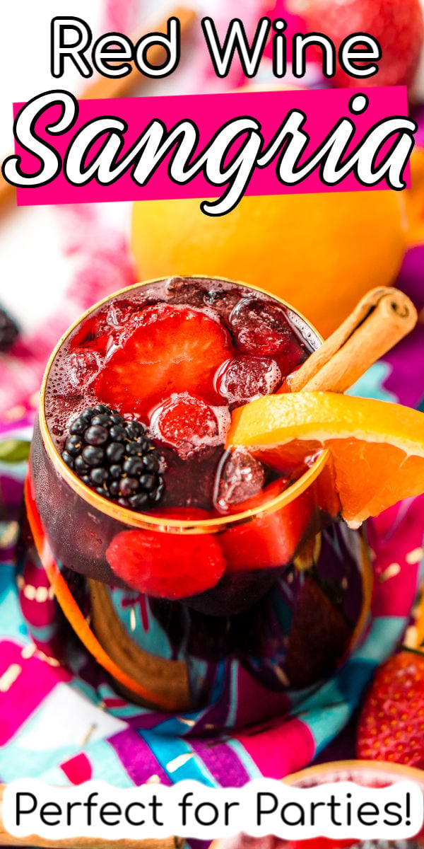 Red Wine Sangria is a delicious batch cocktail that isn't overly sweet and is made with a mix of red wine, brandy, lemon-lime soda, and loaded with oranges, apples, strawberries, and blackberries, plus a touch of cinnamon! via @sugarandsoulco